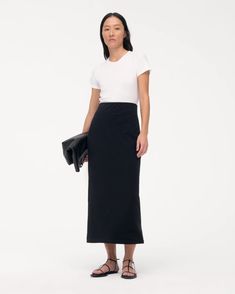 Classic, understated, and versatile - the Tube Skirt has a slim, body-gracing fit whose length can be adjusted by lifting, lowering, or folding the elasticated waist. For elevated casual, pair with the T-Shirt. This custom fabric features a premium organic cotton expertly knit together with lyocell. The lyocell in this Modern Fitted Maxi Skirt, Fitted Modern Lined Maxi Skirt, Modern Fitted Lined Maxi Skirt, Fitted Modern Maxi Skirt With Lined Skirt, Modern Fitted Bottoms For Everyday, Modern Fitted Everyday Bottoms, Classic Fitted Cotton Pencil Skirt, Classic Cotton Fitted Pencil Skirt, Modern Fitted Cotton Skirt