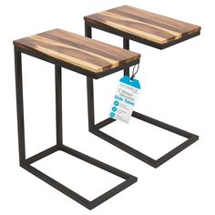 two tables made out of wood and metal with tags attached to the legs, each side