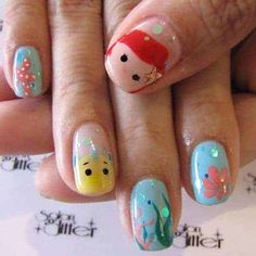 Paznokcie Disney - 19 bajkowych wzorów Check more at https://paznokcie.net.pl/paznokcie-disney-19-bajkowych-wzorow/ Tsum Tsum Nails, Little Mermaid Nails, Disney Themed Nails, Unicorn Nails Designs, Disneyland Nails, Disney Nail Designs, Mermaid Nail Art, Nails Disney, Kids Nail Polish