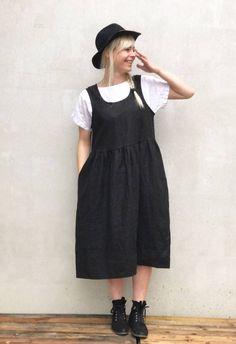 "Simple and comfortable linen pinafore sundress with handy pockets. Wear it alone or with a shirt underneath.  Easy to dress it up or down with a few accessories.  Great linen texture and drape.  Very comfortable and perfect for everyday wear as well as more special occasions. High quality linen with adorable texture.   Made from a 100% medium weight, natural European linen. The linen will become more distinctive the more you wear and wash it.  Each piece is individually cut, sawn and pre-washed Linen Pinafore Dress, Plus Size Sundress, Linen Pinafore, Black Sundress, Linen Sundress, Sukienki Plus Size, Linen Dress Women, Sleeveless Dresses, Maxi Dress Black