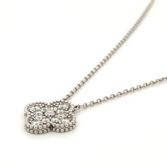 18 Karat White Gold 12 Diamonds, D/VS1 - 0.50 tctw Chain length : 16.5" Exquisite White Gold Diamond Necklace With Sparkling Stones, Luxury Necklaces With Single Cut Cubic Zirconia, Luxury White Gold Diamond Necklace With Sparkling Stones, White Gold Flower Pendant Necklace With Single Cut Diamonds, Classic White Gold Diamond Necklace With Sparkling Stones, Luxury Round Diamond Necklace With Sparkling Stones, Classic White Gold Diamond Necklace With Flower Pendant, Exquisite Cubic Zirconia Necklace With Pave Setting, White Gold Necklace With Single Cut Diamond Flower Pendant