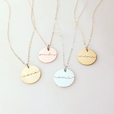 "Be inspiring with your jewelry with words like namaste, be kind, and mama! Wear an inspirational word from our many designs on this disc necklace. Jewelry can be personalized in our beautiful and high-quality silver, gold, or rose gold disk. You can engrave the back side with your kids names, significant dates, or a short phrase. Choose from one of our designs or your favorite font style, metal, necklace length, and chain style to make this completely your own! Perfect for gift giving for any h Dainty Round Pendant Name Necklace For Mother's Day, Mother's Day Engraved Name Pendant Necklace, Mother's Day Dainty Gold-plated Name Necklace, Mother's Day Gift: Round Pendant Name Necklace, Mother’s Day Necklace With Engraved Text, Nana Christmas Gifts, Rose Gold Pendant Necklace, Grandma Necklace, Gold Disc Necklace