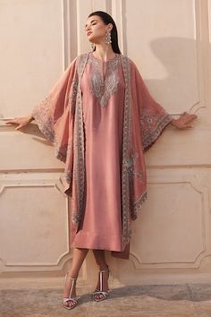 Peach cape featuring flared silhouette and all-over zardozi embroidered floral motifs highlighted by sequins. Paired with a matching embroidered kaftan., Fit: Relaxed Cape Sleeves Kurta With Dabka Work For Eid, Traditional Kurta With Dabka Work And Cape Sleeves, Traditional Kurta With Resham Embroidery And Cape Sleeves, Eid Kurta With Dabka Work And Cape Sleeves, Traditional Wear With Resham Embroidery And Cape Sleeves, Traditional Embroidered Kurta With Cape Sleeves, Traditional Chikankari Embroidered Dupatta, Traditional Dupatta With Chikankari Embroidery And Cape Sleeves, Festive Chikankari Embroidered Dupatta With Cape Sleeves