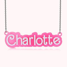 a pink necklace with the word charlotte on it