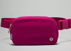 This Lululemon Everywhere belt bag in Wild Berry color is a stylish and functional accessory for anyone on-the-go. With dimensions of 7.5 x 5 x 2 inches, it is the perfect size for carrying your essentials. The bag features a solid pattern and a coated finish for added durability. The lining is made of high-quality fabric, and the handle/strap comes in a matching Wild Berry color. The Lululemon Om Bag product line is known for its quality and craftsmanship, and this belt bag is no exception. It Everyday Lululemon Mobile Phone Bag, Casual Lululemon Bag With Cell Phone Pocket, Lululemon Casual Rectangular Bag, Casual Rectangular Lululemon Bag, Casual Lululemon Bags For Daily Use, Lululemon Rectangular On-the-go Bag, Lululemon Crossbody Bag With Cell Phone Pocket, Lululemon Rectangular Bag With Adjustable Strap, Lululemon Everywhere Belt Bag