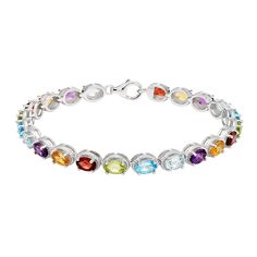 Complement your favorite outfits with this colorful sterling silver and gemstone bracelet. Complement your favorite outfits with this colorful sterling silver and gemstone bracelet.Click on this JEWELRY & WATCHES GUIDE to learn about fit, styles, materials and more! Length: 7 in. Clasp: lobster claw Nickel free Metal: sterling silver Plating: rhodium Finish: polished Packaging: boxedSTONE DETAILS Stone type: Swiss blue topaz, peridot, onyx, lab-created sapphire, amethyst, blue topaz, Swiss blue topaz, citrine, garnet, peridot Stone size: 6 mm x 4 mm Shape: oval Setting: prong Size: 7.25". Color: Multicolor. Gender: female. Age Group: adult. Multicolor Stone Bracelets In Fine Jewelry Style, Multicolor Stone Bracelets Fine Jewelry, Silver Multi-stone Diamond Bracelet, Multicolor Sterling Silver Bracelet With Stones, Sterling Silver Fine Jewelry Bracelets With Stones, Fine Jewelry Silver Diamond Bracelet With Multi-stones, Sterling Silver Multicolor Gemstone Bracelet, Multicolor Natural Stones Bracelet In Sterling Silver, Silver Multi-stone Tennis Bracelet