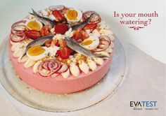 there is a cake that has been decorated with different types of food on it and the words is your mouth watering?