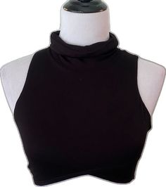 Chic Stretch Sleeveless Crop Top, Black Halter Neck Top With Built-in Bra, Chic Stretch Crop Top Vest, Black High Neck Tank Top For Spring, Black High Neck Tank Top For Night Out, Spring Black High Neck Tank Top, Black Stretch High Neck Tank Top, Black Sleeveless Top With Built-in Bra, Trendy Black Sleeveless Tops