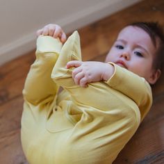 Designed to be all-day comfort from sleeping to playing, this cuddly and super soft one-piece is perfect for playtime, tummy time, and sweet dreams! The incredibly soft Zip Jumpsuit comes in two colors, yellow and mint. It is long sleeve and footed and comes with a nickel-free zipper on the front for super easy dressing. With its neck-to-ankle zipper down one leg, it is easy to dress or change diapers. There’s a snapped protection piece on the neck for the zipper for safety and comfort.Comes in Baby Gift Sets, Tummy Time, Unique Designers, Play Time, Sweet Dreams, Simple Dresses, Super Easy, Baby Gifts, Gift Set