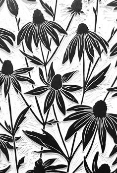 some black and white flowers on a wall