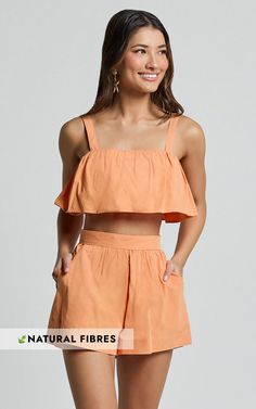 Hannah Two Piece Set - Frill Crop Top and High Waist Shorts in Sherbet Orange Summer Party Tops Short Length, Short Length Tops For Spring Party, Summer Party Crop Top, Orange Party Sets For Summer, Two-piece Tops For Summer Party, Chic Sleeveless Two-piece Set For Summer, Two-piece Summer Party Tops, Spring Party Two-piece Top Set, Summer Party Two-piece Tops