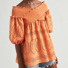 Orange Anthropologie Eyelet Smocked Blouse Top By Sachin & Babi -Eyelet Detail -Smocked Trim -3/4 Puffed Sleeves -Pullover Styling Approx. Dimensions: -27"L Approx. Vacation Smock Blouse With Short Sleeves, Short Sleeve Smock Blouse For Vacation, Bohemian Smocked Short Sleeve Top With Ruffles, Bohemian Smocked Top With Ruffles And Short Sleeves, Summer Brunch Blouse With Smocked Cuffs, Summer Blouse With Smocked Cuffs For Brunch, Chic Smock Peasant Top For Day Out, Short Sleeve Smock Blouse For Beach, Chic Blouse With Smocked Cuffs For Vacation