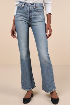 The most stylish 'fits call for a tried and true classic like the Levi's Wedgie Bootcut Medium Wash High-Rise Denim Jeans! Ever-so-slightly stretchy cotton-blend denim (in Levi's Fair Point wash) shapes these timeless jeans that feature a high-rise waist with belt loops, a five-pocket cut, and a branded top button above a hidden button fly. Vintage-inspired bootcut legs boast fading and whiskering for a lived-in effect, before finishing at subtly flared, ankle-length distressed hems. Iconic red Timeless Jeans, Stylish Fits, High Rise Bootcut Jeans, High Rise Denim Jeans, Red Logo, Tried And True, High Rise Denim, Leather Patches, Bootcut Jeans