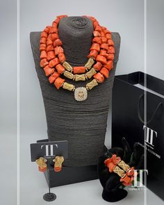 Description Our stunning Coral Bead Necklace and African pendant set are a perfect choice for anyone searching for a unique and eye-catching piece of jewellery. This ethnic necklace is ideal for fashion-forward individuals, who want to add a touch of elegance to their ensemble. Crafted from high-quality coral beads, this African beaded necklace features an intricate design that is a perfect reflection of the rich African cultures and traditions. With this fabulous necklace, you're sure to stand Elegant Red Coral Beads For Jewelry Making, Elegant Orange Red Coral Beads, Elegant Coral Beads, Orange Red Coral Jewelry For Wedding, Orange Red Coral Wedding Jewelry, Elegant Coral Jewelry With Large Beads, Elegant Red Coral Jewelry With Faceted Beads, Elegant Red Coral Gemstone Beads, Traditional Red Coral Beaded Necklaces For Wedding