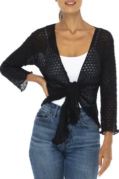 Pretty lightweight soft cotton knit shrug can be worn tied or untied for two fashion looks. Perfect over tops, camisoles, blouses and dresses. This feminine cardigan also provides upper arm coverage for sleeveless tanks and dresses A versatile year around shrug that looks fabulous with any outfit. Pair with shorts, jeans, skirts, sundresses or over swimwear. A comfortable sweater to toss in your bag for a night out or when traveling. 100% cotton is as pretty as it is practical Flattering ¾ lengt Shrug And Tank Top, Spring Knit V-neck Cover-up, Summer Open Front Shrug, Versatile Fitted Wrap Cardigan, Chic V-neck Shrug For Summer, Chic V-neck Summer Shrug, Chic V-neck Shrug For Spring, Trendy Long Sleeve Summer Shrug, Summer V-neck Shrug