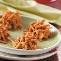 three pieces of food on a green plate