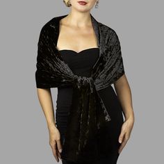 A very elegant velvet shawl for your wedding party or evening dress. Made of luxury bridal velvet.  Color: black  (other colors are available)  Size: 190 cm x 48 cm approx. The shawl on the photo is not lined.  Choose: one sided or double sided (both sides velvet)  For additional request, please contact.  You can use it as a wrap, shawl or stola. WE have matching bags in our Etsy Shop! WE accept credit cards! Warning: Although the fabric we use is of high quality, in certain cases during high hu Luxury Festive Velvet Shawl, Elegant Black Velvet Holiday Dress, Elegant Velvet Dress For Wedding, Elegant Winter Party Shawl, Fitted Evening Shawl, Elegant Velvet Wedding Dress, Black Velvet Gala Dress, Elegant Shawl Wrap Gift, Fitted Black Shawl For Party