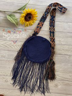 This gorgeous Mexican Bag is perfect to style with any outfit! It is a stunning blend of old traditions and new fashion that will add that special touch to any outfit! It is handwoven by Mexican artisans and has a beautiful hand knit strap as well! Measurements 11' x 11' Traditional Beach Shoulder Bag With Tassels, Blue Bohemian Crochet Bag With Woven Details, Bohemian Woven Crochet Travel Bag, Bohemian Crochet Bag With Fringe For Travel, Bohemian Blue Woven Crochet Bag, Traditional Shoulder Bag With Tassels For Beach, Blue Bohemian Crochet Woven Bag, Blue Bohemian Woven Crochet Bag, Traditional Tassel Shoulder Bag For Beach