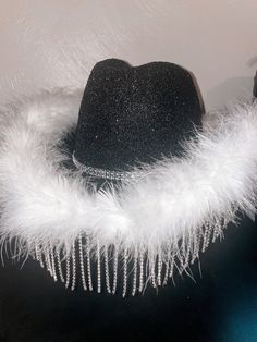 **I will be on vacation from 8/3-8/10 and all orders placed on 7/28 or later will not ship until 8/11 at the earliest** This hat is perfect for concerts, festivals, or any event you would want to wear the perfect accessory to! You have the choice of glitter color and you can add a feather boa if you would like to. The hat comes with rhinestone fringe (of course!) and a rhinestone band around the hat! More information: Glitter color: here you will select what color glitter you want the hat to hav Party Hats Cowboy, Winter Party Top Hat With Curved Brim, Winter Party Top Hat With Short Brim, Winter Party Hats With Short Brim, Winter Party Hat With High Crown, High Crown Hats For Winter Party, Winter Party Fedora Costume Hat, High Crown Winter Party Hat, Silver Brimmed Party Hat