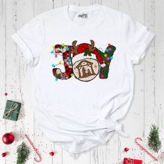 Joy Nativity Shirt, Christmas Shirt, Joy Shirt, Jesus Christian Shirt, Joy Religious Shirt, Faith Shirt, True Story Shirt, Christian Shirt. Joy Nativity Shirt are Bella+Canvas branded. I'll ship it from a brand in the same size and quality if Bella+Canvas is out of stock. Please contact me in case of any problem or request. I'll send you a message to confirm the design if you buy a custom shirt. Please check your ETSY message box. Your satisfaction is important to us :) Please check the size cha Pre-shrunk White Christmas Shirt, Nativity Shirt, Christmas Joy To The World, Scene Shirt, Done With Love, Jesus Christmas, Christian Family, Christmas Jesus, Religious Shirt