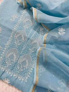 Item Overview ATHARVA Hand Embroidery Salwar Kameez Light Blue/Lucknowi Chikankari/Kota Doria Dupatta/Custom Stitch Unstitch/Custom Anarkali/Gift/ Dno. LUCK08 Fabric: * Shirt: Chanderi Silk- Lucknowi Chikankari Embroidery on Neck and All over Jaal/ 2.5 Mts Beautiful Hand Embroidery * Dupatta:Kota Doria Embroidery Dupatta 2.5Mts/All over Embroidery/ Lucknowi Chikankari * Bottom Santoon Silk 2.5 Mts. *Anarkali Style - - Increased Embroidery All Over the Panel -4.5Mts to 5 Mts Shirt Fabric used -4. Blue Kurta With Dupatta In Traditional Drape, Designer Blue Cutdana Kurta, Blue Traditional Drape Kurta With Dupatta, Blue Resham Embroidered Anarkali Set For Navratri, Blue Anarkali Set With Resham Embroidery For Navratri, Blue Cutdana Straight Kurta, Festive Blue Chanderi Anarkali Set, Blue Anarkali Set With Zari Work For Transitional Season, Transitional Blue Anarkali Set With Zari Work