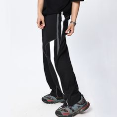 Take your fitness style to the next level with these Casual Functional Wide-leg Sweatpants. The wide-leg design encourages freedom of movement, while the lightweight, breathable fabric offers a comfortable fit. Take on your next challenge with confidence! Features: -80% Polyester, 20% Spandex -Mid-rise Waist -Drawstring Waistband -Stripe design -Regular Fit -Street Style Athleisure Wide-leg Sweatpants For Streetwear, Stretch Wide-leg Parachute Pants For Streetwear, Stretch Wide-leg Athleisure Joggers, Sporty Wide Leg Black Cargo Pants, Sporty Wide-leg Black Cargo Pants, Black Sporty Straight Parachute Pants, Urban Breathable Activewear For Streetwear, Straight Cargo Pants For Streetwear Athleisure, Black Wide Leg Sweatpants For Workout