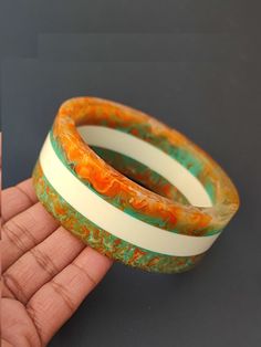 "you will receive 1 piece of Handmade resin bangle Bracelet Colorful Resin Stacking Bracelet  Modern Trendy jewelry Gift For Women Inner diameter= 2.6\" approx. Material: Resin Quantity: 1 Piece Thank you very much for visiting! Any questions, please feel free to contact us. Discount for bulk provide." Retro Handmade Bangle Jewelry, Handmade Orange Cuff Bracelet Bangle, Handmade Orange Bangle Cuff Bracelet, Vintage Resin Bracelet, Handmade Orange Cuff Bangle, White Handmade Bohemian Bangle, Handmade Retro Bangle Bracelet, Handmade Retro Bracelets As Gift, Handmade Artistic Bangle As Gift