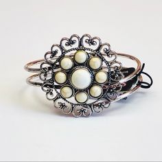 Perfect For Daily Accessory Rustic Design White Adjustable Bangle Jewelry, Elegant Spring Wristlet, Adjustable White Bohemian Cuff Bracelet, Nickel Free White Beaded Bracelets, Elegant White Bracelet For Spring, White Metal Stretch Bracelet For Gifts, White Metal Stretch Bracelet For Gift, Vintage White Bangle Bracelets, White Metal Bangle Jewelry