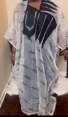 Our Signature Kaftan is a beautiful combination of black and white made from organza and embroidery. The lightweight material ensures you stay comfortable while the elegant appeal adds an elegant touch to any outfit. Let this stylish piece be the star of your wardrobe. Organza Kaftan, Embroidery Kaftan, Embroidered Organza, The Star, Quality Fabric, Must Haves, Embroidery, Black And White, Things To Sell