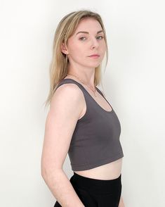 TO TRANSFORM: Wear with the high neckline in the front or flip it around and bring the scoop neck to the front and show a little chest. Sparrow crop is a cool, cropped version of our Sparrow top. PRODUCT DETAILS: - 60% Rayon, 33% Nylon, 7% Lycra- Moisture wicking and four-way stretch - Machine washable and dryer safe - MADE IN USA - Model: Talia is wearing a size small View our shipping and returns policy We'd love to hear from you! Email hello@paridaez.com with any questions. Fitted Crop Top With Built-in Bra And Scoop Back, Chic Scoop Neck Crop Top With Built-in Bra, Casual Crop Top With Built-in Bra And Scoop Neck, Fitted Sports Bra With Scoop Back, Casual Tops With Bra-friendly Scoop Back, Chic Scoop Neck Top, Bra Friendly, Casual Scoop Neck Crop Top With Built-in Bra, Casual Gray Crop Top With Built-in Bra, Fitted Cropped Seamless Tank Top