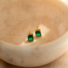 Everything about our Emerald Cut Birthstone Studs make them a must-have staple for your collection. From its personalized touch to its minimalist style — these gemstone earrings coordinate effortlessly with any outfit. Wear them as everyday earrings to work and play, or pair them with a fancier outfit for a night out! They also make special personalized gifts for all the women in your life. Makes sense why they're such a crowd favorite! Material: High Quality Solid 925 Sterling Silver Finish: 18