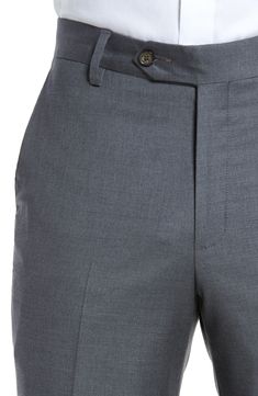 Stretch-infused wool gabardine defines handsome trousers crafted in a crisp, versatile flat-front cut. 16 1/2" leg opening; 9 1/4" front rise; 14 3/4" back rise Zip fly with button-tab closure Slant pockets; back button-closure welt pockets Unhemmed. These trousers can be hemmed for free at your local Nordstrom. Find a store Lined to the knee 98% wool, 2% spandex Dry clean Imported Men's Clothing Wool Trousers, Modern Fit, Welt Pocket, Welt Pockets, The Knee, Men's Clothing, Nordstrom, Dry Clean, Trousers