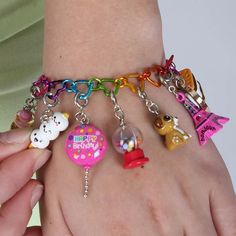 CHARM IT! girls everywhere agree, rainbow goes with everything! Add charms to this bracelet and customize her collection! features & materials 7.5" long, fully adjustable Anodized Base Metal WARNING: Choking Hazard - Small parts. Not for children under 3 years. Bracelet only, charms sold separately Kawaii Jewelry, Stones Jewelry, Heart Chain, Charm It, Making Beads, Cute Charms, Rainbow Heart, Jewelry Beads, Kids Diy