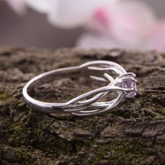 "Celtic style 925 sterling silver womens amethyst promise ring, Unique dainty & elegant promise ring for her, Celtic amethyst engagement ring WE OFFER UNLIMITED PERIOD INSTALLMENTS PLAN This is a beautiful, stunning, feminine ring that works well for all occasions, styles, and ages. You will love it! Ring information Stone: Amethyst Approximate size: 3.5mm Metal type: Silver Metal stamp: 925 Sterling SIlver Customization / Replacements It's easy to create jewelry that's perfect for you. Chan Silver Ruby Promise Ring, Dainty Silver Topaz Promise Ring, Elegant Purple Birthstone Promise Ring, Silver Birthstone Promise Ring, Silver Crystal Birthstone Promise Ring, Elegant Amethyst Birthstone Ring For Promise, Sterling Silver Birthstone Promise Ring, Solitaire Birthstone Open Ring For Promise, Silver Solitaire Ruby Promise Ring