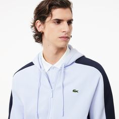 Fashion meets sportswear in this zipped hoodie, featuring a bold, iconic cut-sewn colorblock design. The hood can be adjusted using the textured drawstrings, and the brushed fleece fabric creates a soft, comfortable finish. Lacoste Sport, Zipped Hoodie, Hoodie Xxl, Lacoste Men, High Neck Long Sleeve, Cotton Fleece, Zip Sweatshirt, Favorite Jeans, Fleece Fabric