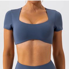 This crop top offers a snug fit that moves with your body, providing the ultimate comfort during intense workouts or casual jogs. The moisture-wicking material keeps you dry, while the stretchable fabric ensures a full range of motion, allowing you to focus on your fitness goals without any distractions. SPECIFICATIONS Product Material: Active Shirt Tops Feature: Breathable The Craft of Weaving: Knitted Women Active Wear, Square Crop Top, Top Run, Bra Crafts, Slim Fit Crop Top, Gorgeous Prom Dresses, Yoga Shirt, Activewear Sets, Maxi Dress Formal