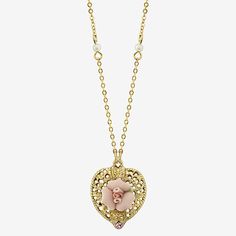 A lovely vintage-inspired accessory that adds a charming touch to any occasion. Featuring a gilded filigree heart pendant with a pink rose made of genuine porcelain and a pink crystal accent which hangs upon a gold-toned chain. Small, delicate faux pearls decorate the chain and complete the look.Pearl Type: Simulated PearlsJewelry Closure: Lobster ClaspShape: Heart, FlowerStone Cut: RoundMetal Color: Gold ToneChain Length: 16 InchExtender Length: 3 InchPendant Length: 25mmPendant Width: 20mmChai Vintage Filigree Heart Pendant Jewelry, Elegant Vintage Heart Pendant Jewelry, Vintage Heart Necklace For Mother's Day, Vintage Gold Necklaces With Heart Charm, Gold Necklace With Heart Charm For Vintage Collection, Vintage Heart-shaped Filigree Necklaces, Vintage Heart Filigree Necklaces, Vintage Heart Filigree Jewelry, Elegant Vintage Charm Necklaces For Mother's Day