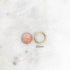 Listing is for a PAIR of stainless steel hoop earrings. Available in gold or silver ➳ Hoop sizes: 11mm, 20mm, or 25mm ➳ Stainless steel material ➳ Tarnish resistant and hypoallergenic for most people ➳ Easy to open and close lever back style ❀❀ SHIPPING & PROCESSING: ❀❀ Please refer to my shop announcements (located on home page) for the latest processing times as they may change All products are MADE TO ORDER ❀❀ RETURN POLICY: ❀❀ Please note that because of health/hygiene reasons, earrings Minimalist Stainless Steel Tarnish Resistant Huggie Earrings, Everyday Nickel-free Round Huggie Earrings, Minimalist Small Hoop Stainless Steel Jewelry, Minimalist Stainless Steel Small Hoop Jewelry, Minimalist Stainless Steel Hoop Huggie Earrings, Minimalist Stainless Steel Hoop Earrings For Everyday, Tarnish Resistant Stainless Steel Huggie Earrings, Stainless Steel Tarnish Resistant Huggie Earrings, Minimalist Metal Round Huggie Earrings