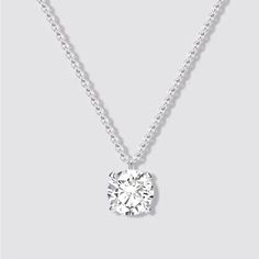 This Stunning Necklace Is A True Piece Of Fine Jewelry. Crafted From 14k White Gold, It Features A Beautiful Round Pendant With One Solitary Diamond. The Pendant Hangs From An 18-Inch Necklace Chain, Making It The Perfect Statement Piece For Any Occasion. The Necklace Is Made With Natural Gemstones And Boasts A Solitaire Setting Style. Its Total Carat Weight Is 1ct, And The Diamond Color Grade Ranges From E-H. Everyday Luxury Sterling Silver Diamond Necklace With Prong Setting, Sterling Silver Necklaces With Prong Setting For Everyday Luxury, Timeless Solitaire Pendant Necklace For Formal Occasions, Timeless Solitaire Pendant Necklace For Formal Events, Vvs Clarity Solitaire Pendant Necklace For Formal Occasions, Everyday Luxury Necklace With Round Cut Diamond, Formal Solitaire Pendant Necklace With Brilliant Cut, Everyday Luxury Round Cut Diamond Necklaces, Everyday Luxury Necklaces With Round Cut Diamond