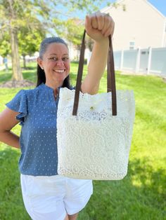 Every gal needs a lightweight, small Summer-vibe handbag! Just a dainty little thing that you can take with you on your minimalist getaway! This handbag will fit all your essentials and pair perfectly with all your stylish vacation or Summer outfits! Crochet Lace Shoulder Tote Bag available in Beige or White Bag Dimensions: 12" H x 5" W x 11" L 2 Straps: 23" each end to end Strap Drop: 9" Magnetic Snap Closure Summer Bag With Adjustable Strap For Everyday, Summer Bags With Removable Pouch For Everyday Use, Everyday Summer Bag With Adjustable Handle, Everyday Summer Bags With Adjustable Handle, Summer Everyday Bag With Adjustable Handle, Chic Lightweight Beach Bag, Chic Lightweight Shoulder Bag For Travel, Chic Lightweight Travel Shoulder Bag, Everyday Handheld Beach Bag With Adjustable Strap