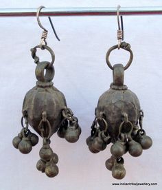 VINTAGE ANTIQUE TRIBAL OLD SILVER EARRING PAIR FROM RAJASTHAN INIDA,USED BY TRIBAL PEOPLE OF RAJASTHAN. GREAT DESIGN ADORN WITH SILVER BELLS, GOOD FOR TRIBAL STYLE BELLY DANCE, OR EVERY DAY WEAR.Long with wire - 6 cm(2.36")width max. - 1.5 cm(0.59")Weight - 23.5 gramsMaterial - silver and original old worn pair. Traditional Bronze Jewelry With Antique Finish, Traditional Bronze Jewelry For Rituals, Traditional Bronze Nickel-free Earrings, Traditional Nickel-free Bronze Earrings, Traditional Antique Silver Jewelry For Festivals, Antique Finish Jewelry For Festivals, Antique Finish Jewelry For Festival, Vintage Metal Jewelry With Latkans, Vintage Dangle Jewelry With Latkans