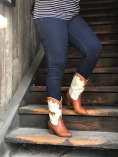 1950's Inspired Bucking Horse Adorned Western Boots. Proud To Be 100% Vegan Friendly. Upper Material: Faux Textured Leather Lining: Man Made + Fabric Step In Boot w/ Inner Tab For Easy Access. Heel Height: 3" Inches Approximate Shaft Height: (based on size 6 from top to back counter) 7 1/2" Inches / Mid Calf Height Fits True To Size, Please Size Up 1/2 If You Take A Wider Width. For Any Sizing Suggestions, Please Contact Customer Care. Imported Bucking Horse, Proud To Be, Customer Care, Western Boots, Vegan Friendly, Mid Calf, Easy Access, Riding Boots, Heel Height