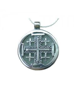 a silver pendant with a cross on it