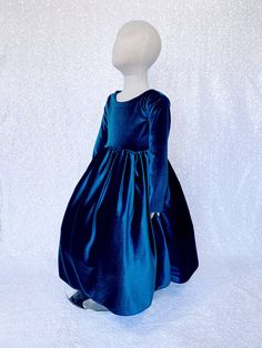 The perfect dress for a fancy and formal occasion such as weddings, birthdays, graduations and photoshoots! This stretch velvet dress comes with long sleeves and a v-back. The zipper can be found on the back of the dress. The stretchy material makes it for a comfortable fit. Underneath the bottom of the stretch velvet skirt is a layer of lining with crinoline attached for added shape. *Mannequin has petticoat to show detail. !PETTICOAT NOT INCLUDED! LINK TO PURCHASE PETTICOAT: https://www.etsy.c Birthday Party Photoshoot, Photoshoot Graduation, Stretch Velvet Dress, Blush Gown, Heavy Dresses, Party Photoshoot, Peacock Dress, Blue Peacock, Graduation Photoshoot