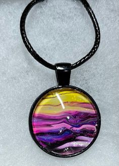 This beautiful sunset inspired necklace is handmade by me with acrylic paints and glass. I use high quality acrylic paints and materials Artsy Multicolor Necklaces With Artistic Design, Artistic Hand Painted Round Necklace, Colorful Artsy Necklace For Gifts, Colorful Artsy Necklace For Gift, Artistic Resin Necklaces With Round Pendant, Artistic Resin Necklace With Round Pendant, Artistic Resin Pendant Necklace, Artistic Resin Round Pendant Necklace, Artistic Round Glass Necklaces