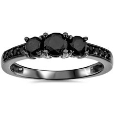 This women's ring features all black diamonds, all diamonds are prong set in solid 10k white gold with black finish. The Heat Treated Black Diamonds are irradiated, the color is permanent and does not require any special care. The black gold does require some maintenance to maintain the black luster. Size: 4. Gender: female. Age Group: adult. Black Diamond Jewelry, 3 Stone Ring, Black Gold Ring, Black Gold Jewelry, Rings Accessories, Black Diamond Engagement, Black Diamond Ring Engagement, Three Stone Ring, Black Diamond Ring