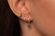 ✨Emerald Gold- Plated Silver Hoop Earring Set. This Stacking Earring Set is perfect for everyday wear, or a beautiful gift for a special lady! :) ✨Product specifications:  * Material: Sterling silver with Zircon  * Hoops Diameter (inner): 7mm.  * Hoops width: 2mm. *Stud:4mm. ✨✨FREE PERSONALISED GIFT POUCH WITH EVERY ORDER Select a gift pouch colour (lilac or cream - refer to the last photo for guidance) and make it your own by adding up to 10 letters or numbers as a personal touch. I will gladly include a gift message. ✨Shipping:  * All orders will be shipped out within 1 business day after receiving the order.  *UK delivery aim: 1-2 working days *Europe delivery aim: 3-5 working days  *Worldwide delivery aim: 5-7 working days  (weekends excluded) ✨Care instructions: * Avoid contact with p Green And Silver Earring Stack, Green Earring Stack, Dainty Green Hoop Jewelry, Green Dainty Hoop Jewelry, Green Dangle Hoop Earrings, Piercing Stacking, Hoop Earring Stack, Hoop Earring Set, Gold Hoop Earring