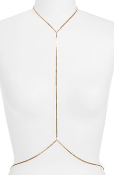 Completely wrap yourself in shine with this sleek body chain. 18k-gold plate Made in the USA of imported materials Minimalist Gold Body Chain, Elegant Gold Body Chain With Chain Strap, Minimalist Gold Body Jewelry For Party, Gold Metal Body Chain, Elegant Gold Body Chain With Delicate Chain, Adjustable Gold Lariat Necklace For Party, Gold Body Chain With Chain Strap, Gold Lariat Necklace With Adjustable Chain For Party, Gold Delicate Chain Body Jewelry For Party