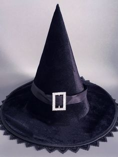 The whole of this hat is black. It is very suitable for people to wear on Halloween day.  This price is for a witch hat only. Black Top Hat For Halloween, Black Witchy Hat For Halloween, Black Brimmed Top Hat For Halloween, Spooky Black Costume Hat, Black Brimmed Witchy Costume Hat, Black Brimmed Hat For Halloween, Witchy Black Brimmed Costume Hat, Black Brimmed Halloween Hat, Black Witchy Brimmed Costume Hat