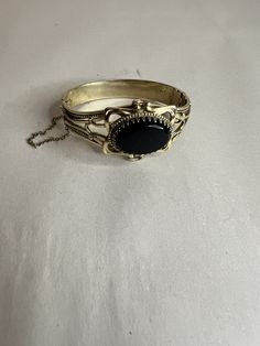 Good vintage condition. Signed Formal Metal Bracelets With Antique Finish, Vintage Metal Bangle Bracelets, Vintage Brass Bangle Bracelet, Vintage Brass Bangle Bracelets, Vintage Round Chain Bracelet, Vintage Brass Cuff Bracelet For Formal Occasions, Vintage Black Chain Jewelry, Vintage Adjustable Chain Jewelry, Vintage Bangle Chain Bracelet As Gift